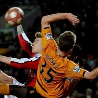 Gol Telat Bendtner Menangkan Arsenal