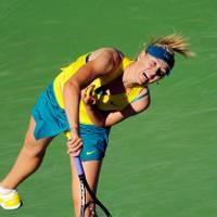 Sharapova Angkat Koper