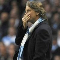 Mancini Optimistis Dipertahankan