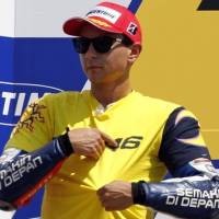 Podium Lorenzo untuk Rossi