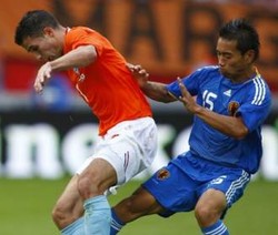 Singa Oranye Sempurna Lawan Asia 