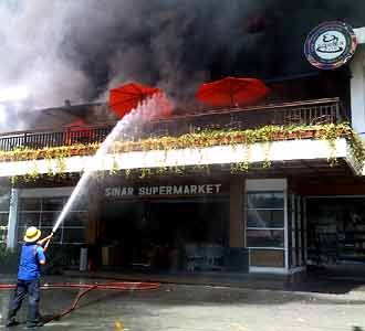 Sinar Supermarket Dilalap Api 