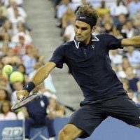 Federer Berakrobat ke Babak Kedua