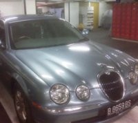 KPK Sita Mobil Jaguar Gubernur Sumut Syamsul Arifin 