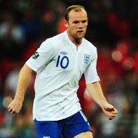 Peran Baru Rooney Dipuji Walcott