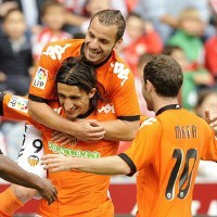 Atasi Gijon, Valencia Pimpin Klasemen