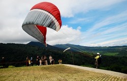 Terbang Tertiup Angin