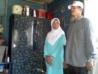 Satu Rumah di Dua Negara