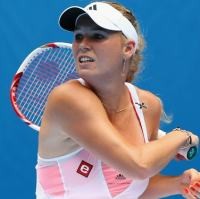 Wozniacki, Henin ke Babak Ketiga