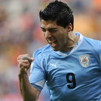 Bersama Si Merah, Suarez Ingin Sukses