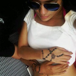 Cinta Sheila Marcia & Kiki Diabadikan Lewat Tato