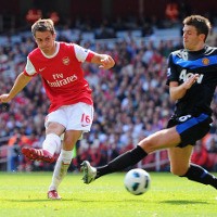 Ramsey Antar Arsenal Atasi MU