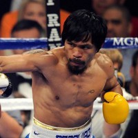 Kalahkan Mosley, Pacquiao Pertahankan Gelar
