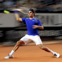 Federer Singkirkan Tsonga