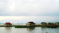Menikmati Refleksi Lukisan Tuhan di Danau Tondano