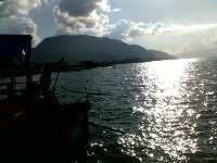 Menikmati Lembayung Celebes di Atas Jalanan yang Babak Belur