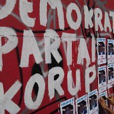 Aktivis Bendera Sebar Ratusan Foto Buron Nazaruddin