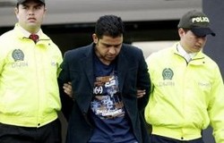 Ditangkap, Nazaruddin Diborgol dan Tertunduk Lesu