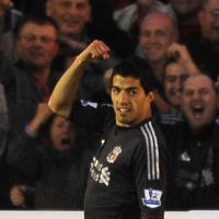 Suarez Mengejar Fowler