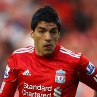 Redknapp Menyesal Tak Rekrut Suarez