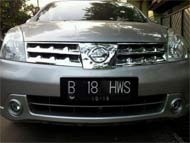 Iklan Nissan Memakai Plat B 18 HWS Tanpa Izin