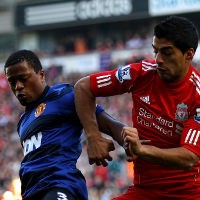 Suarez Tidak Menghina Evra