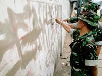Bersih-bersih Coretan Dinding