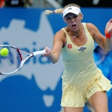 Wozniacki dan Li Na Melaju ke Perempatfinal