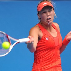 Wozniacki dan Federer Melaju