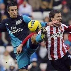 Gol Telat Henry Menangkan Arsenal