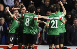 Para pemain Bilbao merayakan kemenangan mereka. Bilbao tercatat memenangi ball possession hingga 55% di akhir laga. Reuters/Nigel Roddis.