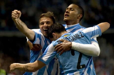 Malaga dan Sevilla Petik Kemenangan