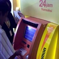 Temasek Lepas Saham Danamon 