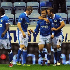 Kemenangan Bersejarah untuk Wigan