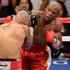 Kalahkan Cotto, Mayweather Masih Tak Terkalahkan