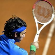 Federer Melaju ke 8 Besar