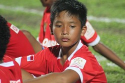 Ini adalah Ghulam Fathur Rahman yang bermain sebagai gelandang serang. Remaja berusia 13 tahun ini adalah pemain paling pendek di skuad Yamaha Indonesia U-13, yakni 146 cm.