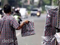 Marak Penjualan Baju Kotak-kotak Jokowi di Jakarta
