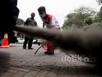 Knalpot Berasap Hitam Pekat Disisir