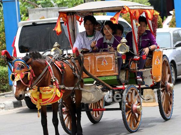 Saat Coboy Junior Naik Delman