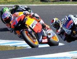 Pedrosa KO, Stoner Menang, Lorenzo Juara Dunia