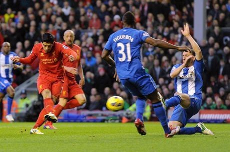Suarez Dua Gol, Liverpool Tundukkan Wigan 3-0