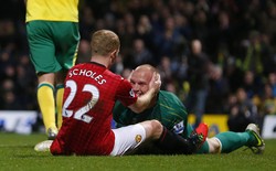 Penampilan bagus penjaga gawang Norwich, membuat sejumlah peluang yang diperoleh Paul Scholes gagal menjadi gol. REUTERS/Andrew Winning.