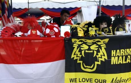Atribut Malaysia dan Indonesia Paling Banyak Dijual, Loket Masih Sepi