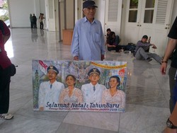 Jokowi-Ahok Terima Lukisan Penolak Banjir dari Sutanto