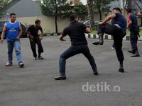 HUT ke-32 Satpam Aksi Debus