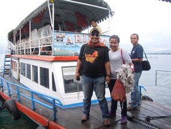 Cara Lain Menikmati Danau Toba: Naik Kapal dari Balige!