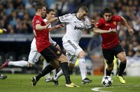 Leg kedua akan digelar di Old Trafford pada 5 Maret mendatang. Untuk lolos ke perempatfinal, Madrid butuh kemenangan atau hasil imbang dengan skor lebih dari 1-1. Sementara itu, hasil imbang tanpa gol akan cukup untuk meloloskan MU. REUTERS/Susana Vera.