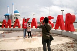 Begini Cara yang Benar Menikmati Pantai Losari