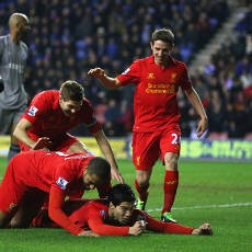 Trigol Suarez Bawa Liverpool Hantam Wigan 4-0